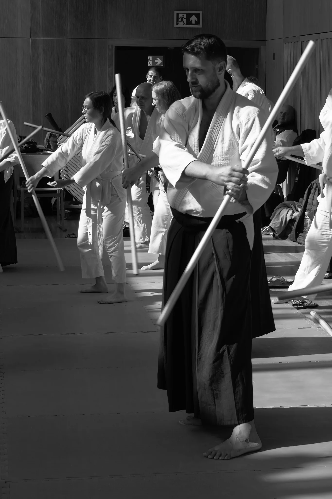 Roger Wood practising with a jo during an Aikido seminar