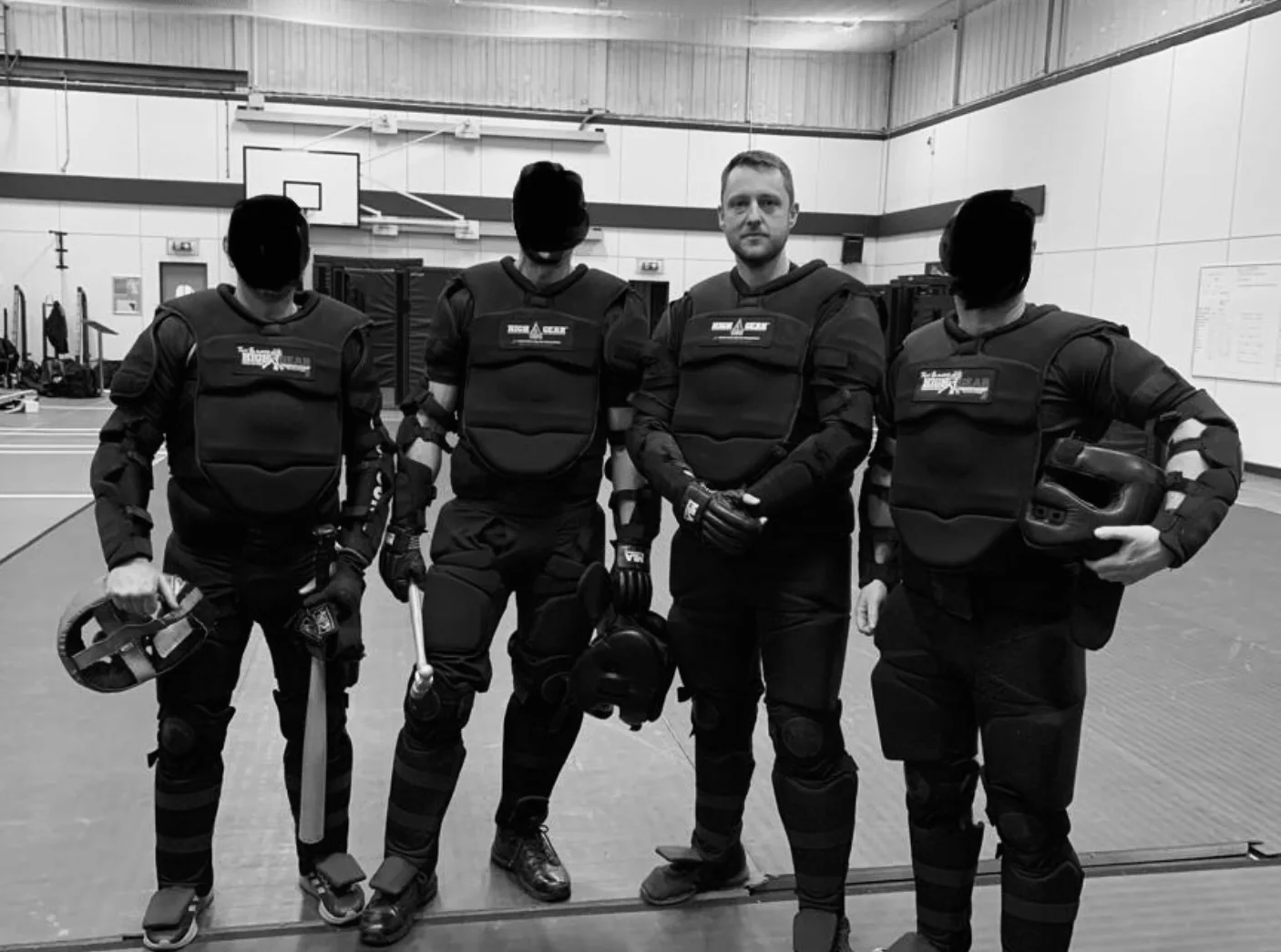 Roger Wood with officers during police defensive skills training